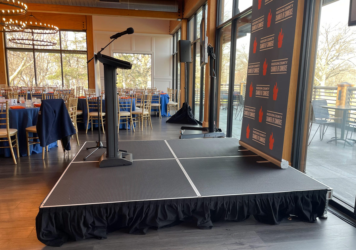 Podium with wireless microphone on stage at NJ event Bergen AV